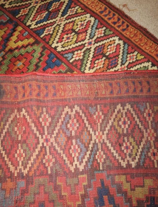 Remarkable colorful Sauj Bolagh Kurdish long rug with a step diamond field and fascinating border
                  