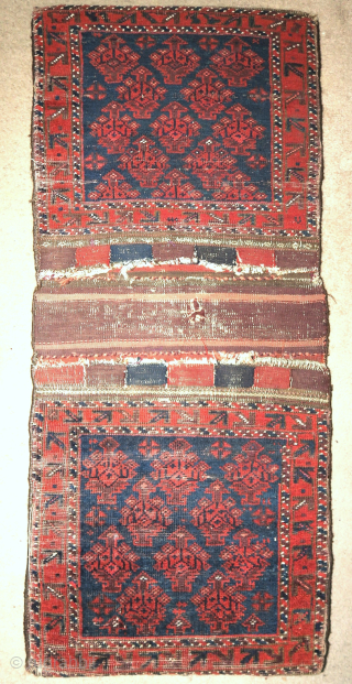 Pair of complete green-ground Baluch khorjin with aubergine. Western Afghanistan, color is really good and difficult to capture. Subtle idiosyncratic drawing improvisations throughout. Soft wool,  Great colorful striped flatwoven back  