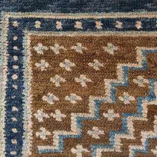 Tibetan square with a diamond design, 19th century?, tie-dyed textile strip sewn onto back                   