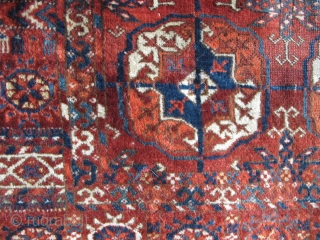 Tekke Long Rug, All colors are good, wool is soft and there are some silk highlights. Complete but with areas of wear and a stain at the very top. Older than most  ...