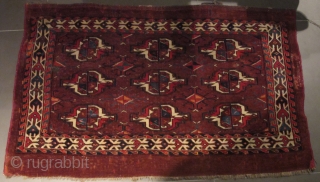 Yomut Turkmen Chuval, great vibrant natural color including some silk highlights in the centers of the bottom guls. Relatively complete with some damage/restoration to the sides. Nice spacing and handle. A vibrant  ...