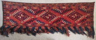 Ersari trapping with a dyrnak gul design. Excellent condition. Nice color and abrash, 5'0"x1'4" excluding original tassels.                