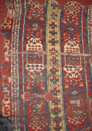 East Anatolian Kurdish rug fragment. Super vibrant madder. mounted and conserved.                      