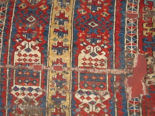 East Anatolian Kurdish rug fragment. Super vibrant madder. mounted and conserved.                      