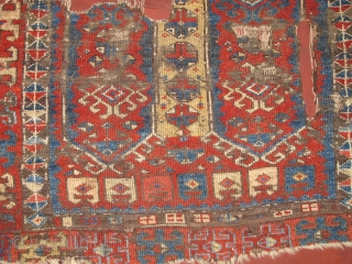 East Anatolian Kurdish rug fragment. Super vibrant madder. mounted and conserved.                      
