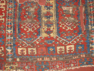 East Anatolian Kurdish rug fragment. Super vibrant madder. mounted and conserved.                      
