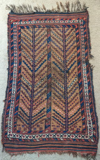 Camel-ground tribal rug with a pair of abstracted trees. 19th century, all good colors. Black, tan, grey, and red weft. Asymmetric knot open right. Some type of rustic south Persian tribal, perhaps  ...