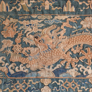 Chinese embroidered five-clawed dragon on velvet. Intricately drawn and embroidered using several techniques. Possibly late Ming but probably early Qing, part of a banner made for the Tibetan market (or at least  ...