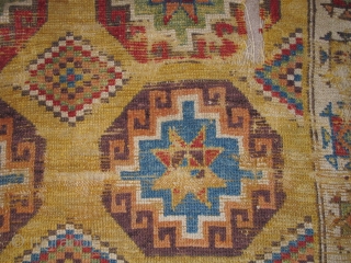 Konya Memling Gul Rug, fragmented at top. Memling guls measure about 13" square with some variations. Fantastic vibrant color including aubergine, apricot and modeled greens. Very probably 18th century, size is apx.  ...