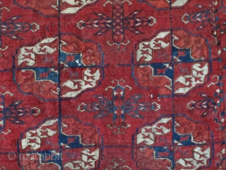 Old Tekke Main Carpet fragment. Old, lush and supple with a velvety buttery feel. Fantastic drape and saturated color.              