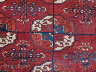 Old Tekke Main Carpet fragment. Old, lush and supple with a velvety buttery feel. Fantastic drape and saturated color.              