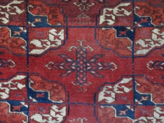 Old Tekke Main Carpet fragment. Old, lush and supple with a velvety buttery feel. Fantastic drape and saturated color.              