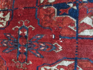 Old Tekke Main Carpet fragment. Old, lush and supple with a velvety buttery feel. Fantastic drape and saturated color.              