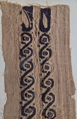 A Coptic textile band with very intriguing negative space                        