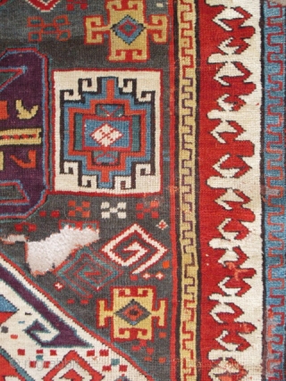 Lenkoran design Kazak? fragment. Top notch color including a perfect grape purple. The blue-grey ground is rare and a great backdrop for such boldly drawn and colored ornament. Dynamic drawing with Memling  ...