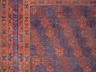 Baluch Rug with shrub pattern field, a few animals too. The way the blue border breaks is a nice feature rarely encountered. A few highlights with cochineal, good weave in good shape  ...