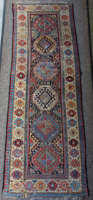 Akstafa Caucasian runner, fun thing in messed up condition with bad repair and some fuchsine dye. The other colors are vegetable dyes and quite nice. Still has some utility. Fun antique thing  ...