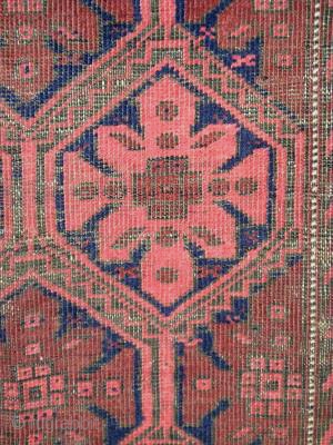 Antique Baluch Rug with rosettes in a lattice. All narural colors. 89x 152 cm(35''x60'' inches)
                  
