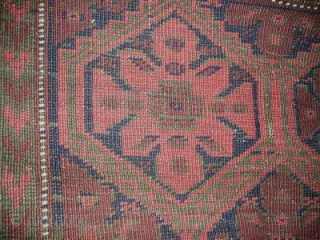 Antique Baluch Rug with rosettes in a lattice. All narural colors. 89x 152 cm(35''x60'' inches)
                  