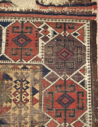 camel ground Baluch rug. Intriguing design with a border inspired by Shahsevan sumaks. Finely woven but with corrosive browns and obvious wear. Flat back and 4 chord goat selvedge. 2'9"x4'2"
Ask about this 