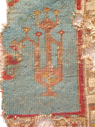 Ladik Prayer Rug, late 18th century, severely fragmented in two sections, dynamic drawing with many stylized ewers, very dirty and damaged but with a vibrant and uncommon gold border, recently found in  ...