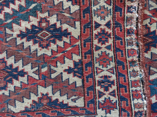 Elongated Yomud asmalyk with mixed cotton and wool weft and interesting almost 'ying yang' drawing at the top of the central point.           