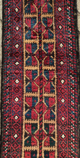 Very long Baluch pile trapping of some sort. Looks almost like a balisht on growth hormones. Classic Baluch leaf design on a camel ground, soft lustrous wool, saturated natural color. Excellent condition  ...
