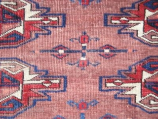 Turkmen chuval. Mostly asymmetrically knotted open left, but with some bands of symmetrical knots in the lower border. Dark wefts, unusual palette. Looks very Yomut but some would call it ''Eagle Group  ...