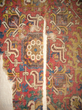 Caucasian Blossom Carpet Fragment, excellent drawing and colors, 17th/ early 18th century. This is the top left-hand corner of the carpet. It is photographed here upside-down. Mounted and conserved. 41"x61" / 104x163cm  ...