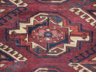 Very uncommon Kizyl Ayak Turkmen main carpet fragment featuring large chuval-style guls with substantive silk highlights. 17"x24"                