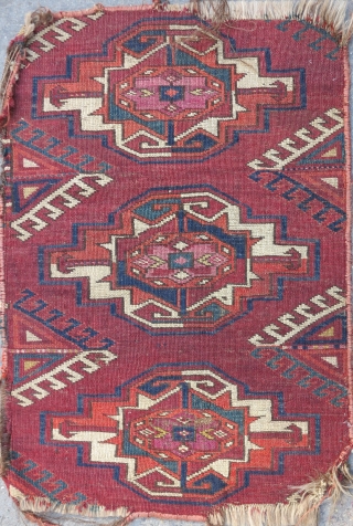 Very uncommon Kizyl Ayak Turkmen main carpet fragment featuring large chuval-style guls with substantive silk highlights. 17"x24"                