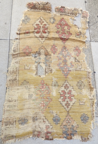 Konya Cappadocia rug fragment, 17th/18th cen. Tile design on a modulated tawny and yellow ground. great color, cool construction, obvious condition issues :) size: 3'4"x5'        