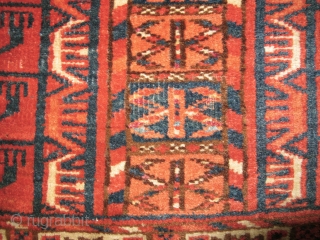 Tekke Ensi, some silk highlights, interesting sainak formation, area of repair in bottom left border. Flashy color including a light blue and insect red. Velvety pile.       