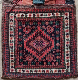 Baluch complete double saddle bag set, a small khorjin or possibly a chanteh set? Sistan area. Silk pile highlights in the center of each bag face. All natural dyes, great wool with  ...