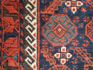 Arab? Baluch Rug . asymmetrical knot open right but with 4-chord goat selvedge. Running dog minor borders and other features of Khorossan minakhani Baluchis of the depressed warp type but without the  ...