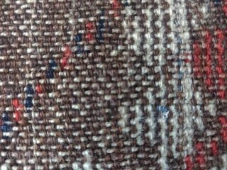 Baluch 'crypto prayer rug'? with a dramatic border break at the top and blue and white silk knots punctuating a line about a quarter up from the bottom. Worn with weft showing  ...