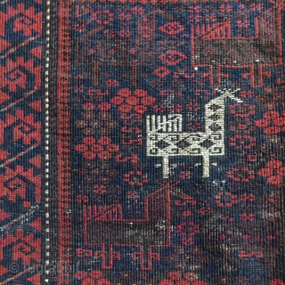 Baluch bird bag face with a curled leaf border                        