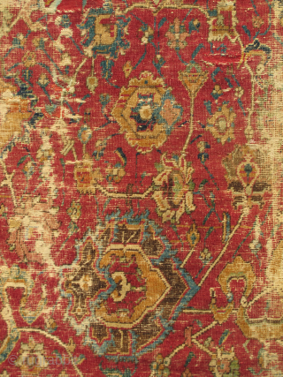 Isfahan Carpet, Safavid era, first half 17th century, silk and cotton warp, cotton weft, lac red ground, fine weave, cut and shut, scattered old repair and damage, still majestic. size= 4'8"x6'
 Note  ...