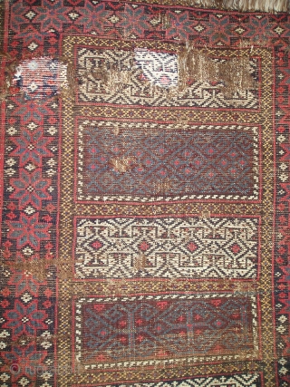 Enigmatic Baluch weaving. Probably a Poshti but perhaps some other sort of bag or bridge. It is symmetrically knotted  using a design repertoire  more commonly seen in flat-woven pieces. The  ...