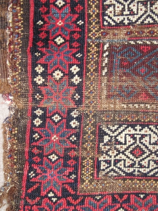 Enigmatic Baluch weaving. Probably a Poshti but perhaps some other sort of bag or bridge. It is symmetrically knotted  using a design repertoire  more commonly seen in flat-woven pieces. The  ...