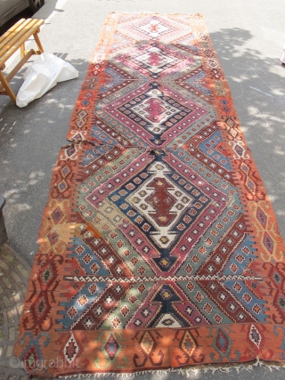 Very long antique Reyhanli kilim from Eastern Anatolia. Older than most with a very good color range and saturation including a great ox-blood maroon, two greens two oranges, at least three blues,  ...