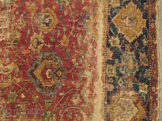 Isfahan Carpet, Safavid era, first half 17th century, silk and cotton warp, cotton weft, lac red ground, fine weave, cut and shut, scattered old repair and damage, still majestic. size= 4'8"x6'
 Note  ...