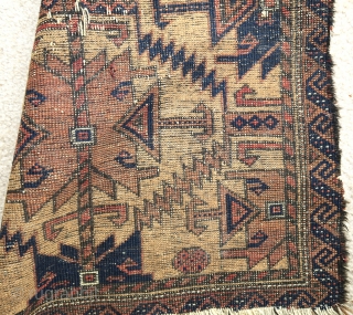 Baluch camel ground prayer rug with large ashik like design, black animal hair weft, tight thick weave, condition is quite messed up but the piece is still quite compelling.    