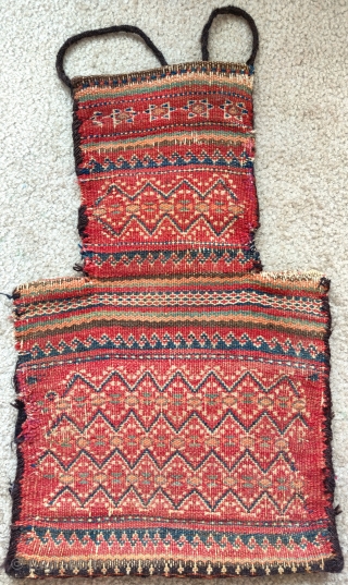 Baluch double-sided flatwoven salt bag, tribal region, Northwest frontier, an old one with great color and execution, old repair in one side at the edge of the neck which itself is probably  ...
