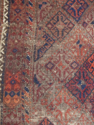 Square-shaped Baluch rug with a repeat diamond latch-hook design. All good color with a subtle but effective use of to tone. Thick patches of indigo dyed pile contrasting with corroded brown and ...