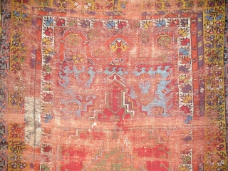 Smashed but Fantastic Anatolian Prayer Rug. Mudjur / Kirshehir type with super-saturated colors including vibrant red and blue, true aubergine, two greens orange and golden yellow. The border system represents familiar elements  ...