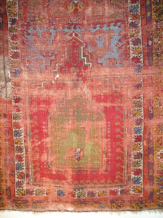 Smashed but Fantastic Anatolian Prayer Rug. Mudjur / Kirshehir type with super-saturated colors including vibrant red and blue, true aubergine, two greens orange and golden yellow. The border system represents familiar elements  ...