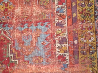 Smashed but Fantastic Anatolian Prayer Rug. Mudjur / Kirshehir type with super-saturated colors including vibrant red and blue, true aubergine, two greens orange and golden yellow. The border system represents familiar elements  ...