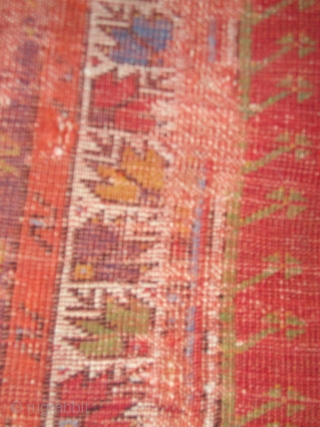 Smashed but Fantastic Anatolian Prayer Rug. Mudjur / Kirshehir type with super-saturated colors including vibrant red and blue, true aubergine, two greens orange and golden yellow. The border system represents familiar elements  ...