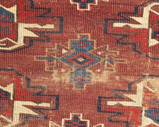 Turkmen Yomut Chuval, worn but much more interesting than most of the type. fine weave, precision detailing and great color saturation. Very interesting things happening within the negative space, especially within the  ...